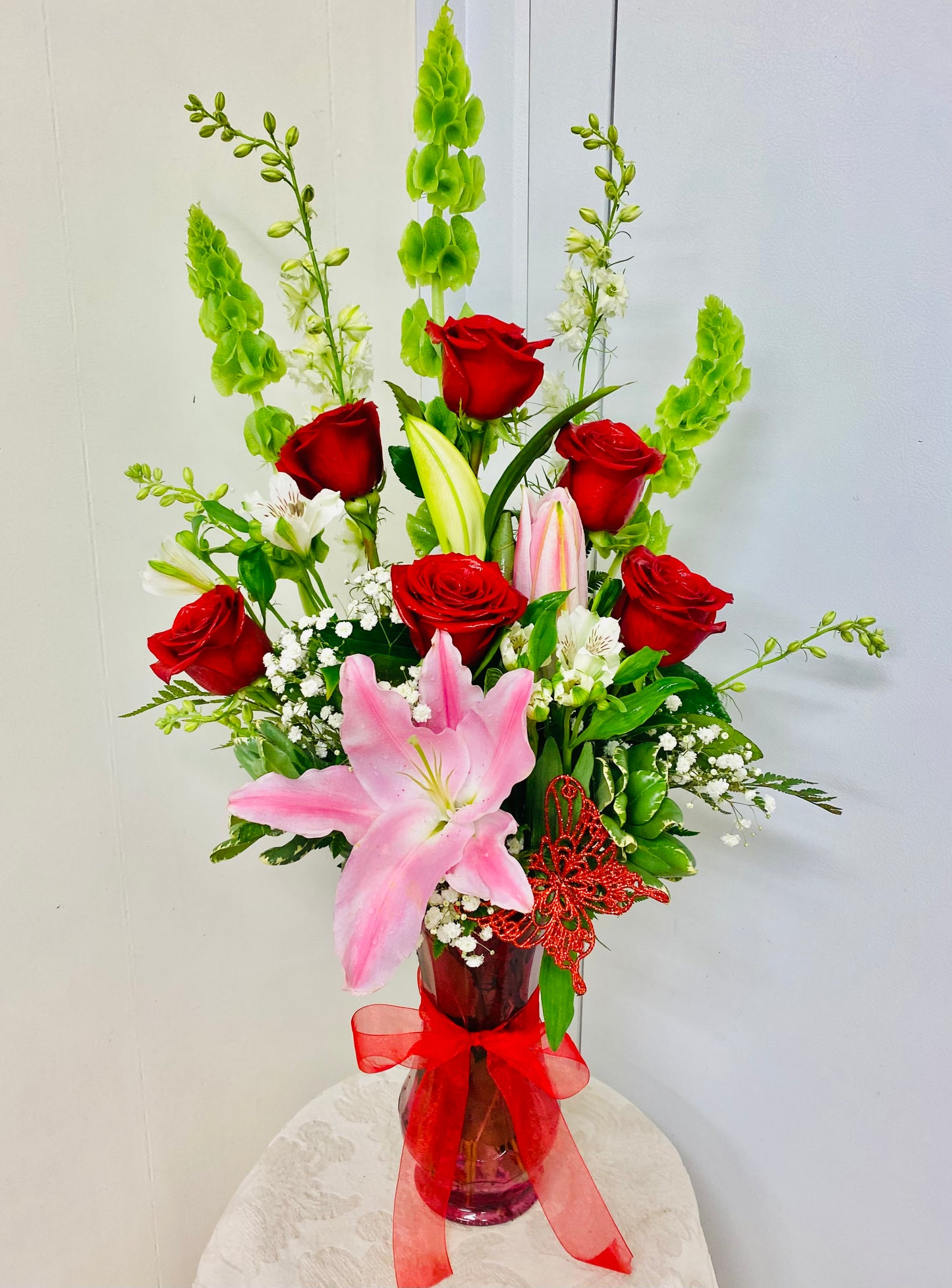 A Flutter of Love Bouquet Half Dozen Rose With Stargazer Lily and a Glittering Butterfly – Brea Florist, Brea CA